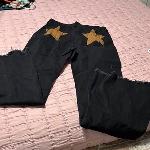 Amazon Black Boot Cut Pants with Brown Star Accents